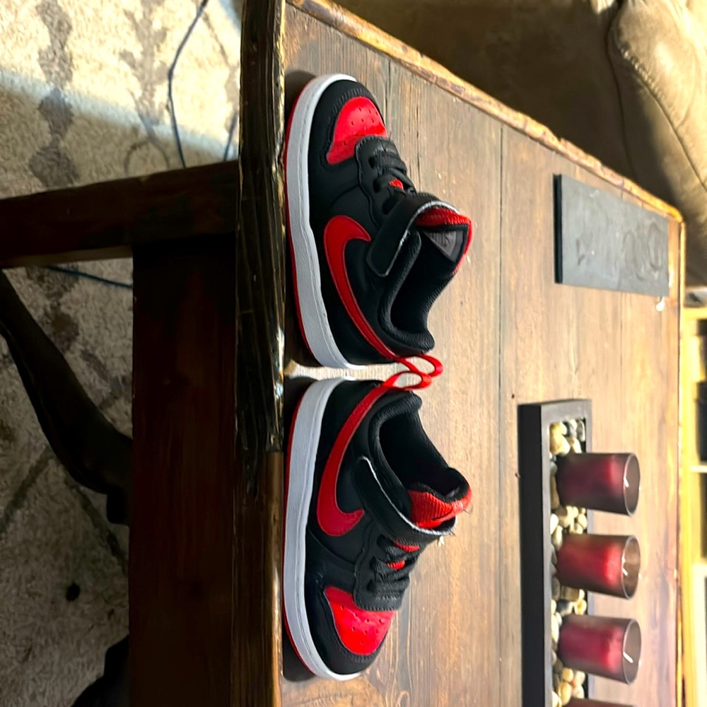 Kids red and black Nike all play